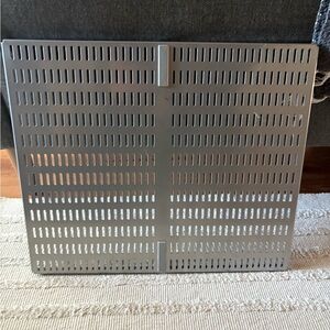 Elfa Utility Peg Board with attachments.